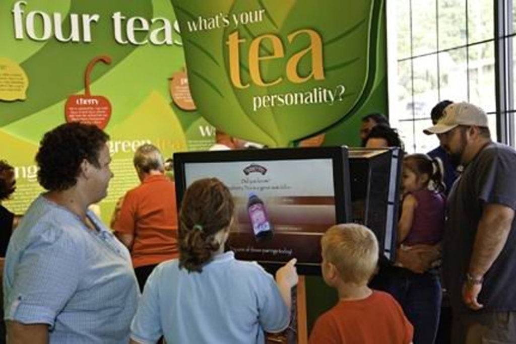 Families gathering in the What's Your Tea Personality exhibit