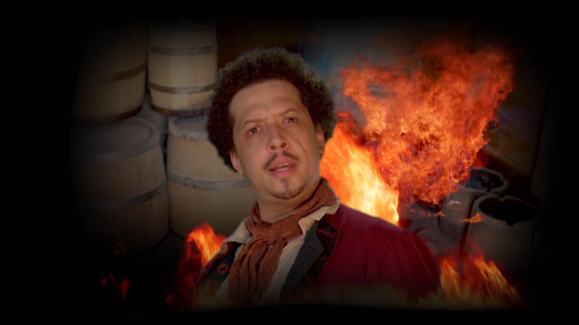 Pirate actor in front of fiery scene
