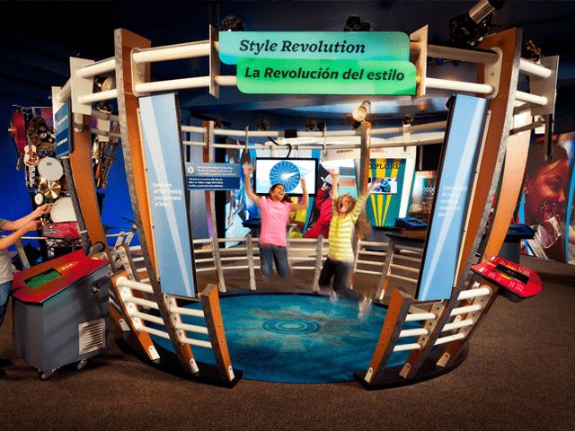 Children engaged in Math Alive's educational traveling exhibit involving 360 cameras